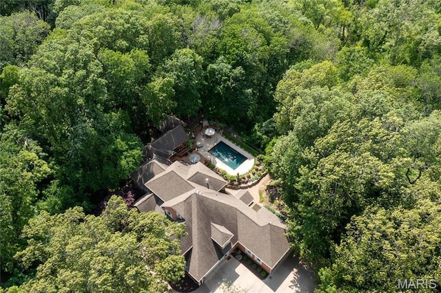 view from above of property featuring a forest