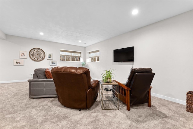 carpeted living room featuring recessed lighting and baseboards