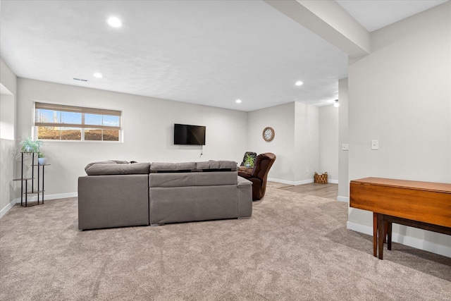 carpeted living room with baseboards and recessed lighting