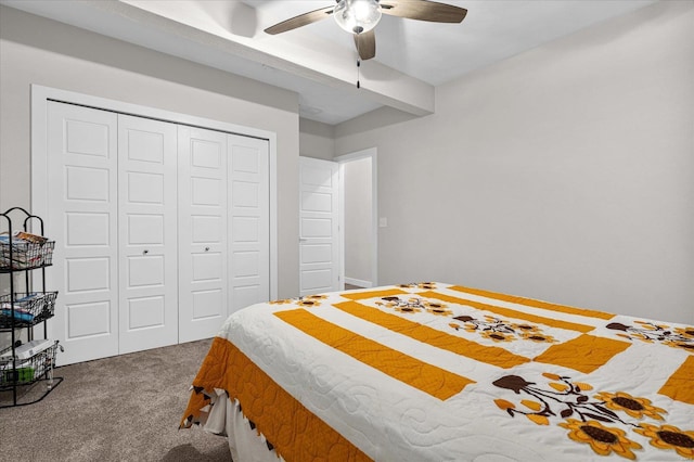 carpeted bedroom with a closet and a ceiling fan