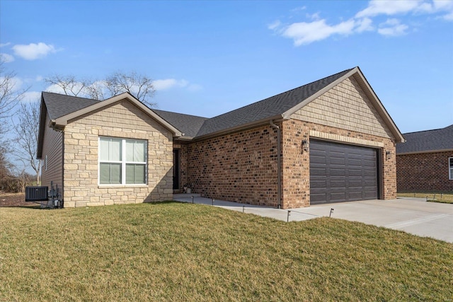 ranch-style house featuring a garage, concrete driveway, a front yard, and roof with shingles