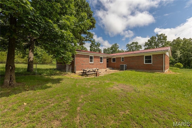 1575 County Road 3290, Salem, MO 65560 - rear view of property with cooling unit, brick siding, and metal roof
