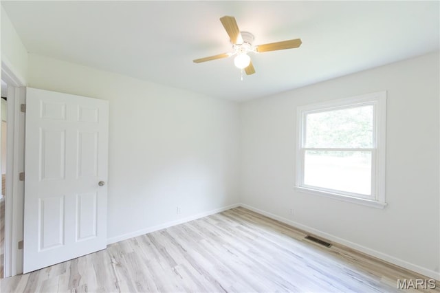 1575 County Road 3290, Salem, MO 65560 - unfurnished bedroom with light wood finished floors, baseboards, and ceiling fan