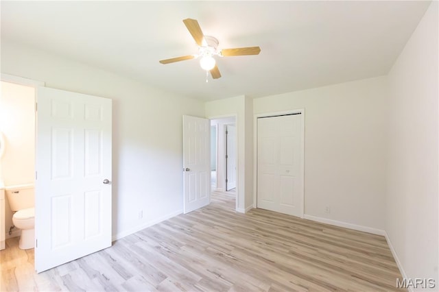 1575 County Road 3290, Salem, MO 65560 - unfurnished bedroom with light wood finished floors, baseboards, a closet, and ceiling fan