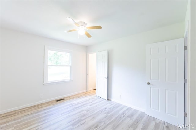 1575 County Road 3290, Salem, MO 65560 - unfurnished bedroom with light wood-style floors and ceiling fan
