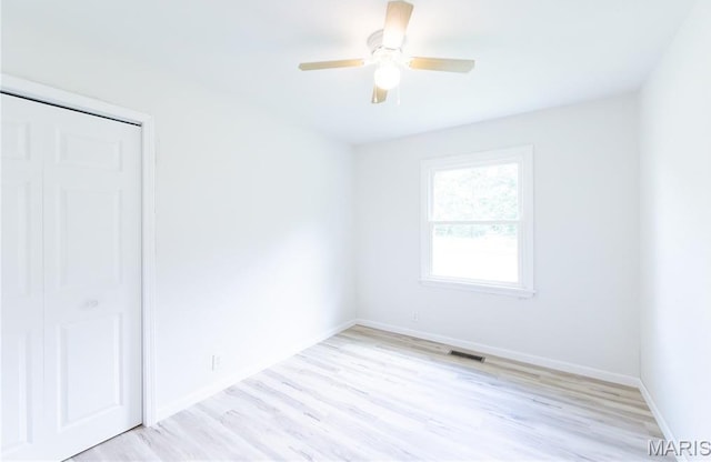 1575 County Road 3290, Salem, MO 65560 - unfurnished bedroom with light wood-type flooring, baseboards, and a ceiling fan