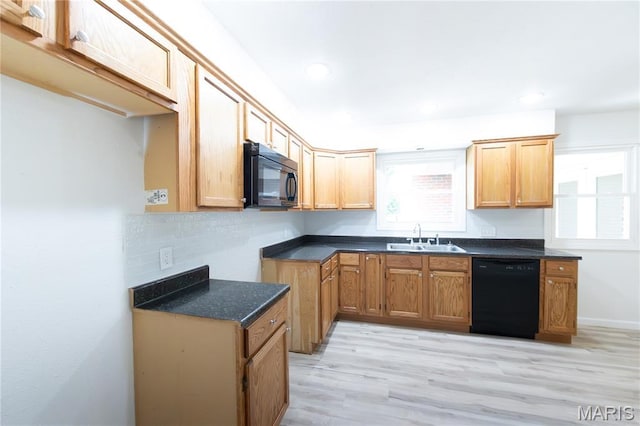 1575 County Road 3290, Salem, MO 65560 - kitchen featuring black appliances, a sink, dark countertops, light wood finished floors, and recessed lighting