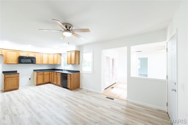 1575 County Road 3290, Salem, MO 65560 - kitchen featuring black appliances, a ceiling fan, light wood-type flooring, a sink, and baseboards