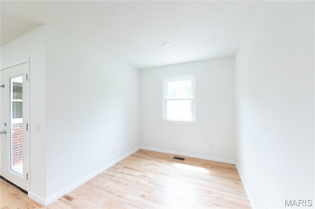 1575 County Road 3290, Salem, MO 65560 - spare room featuring light wood-type flooring and baseboards