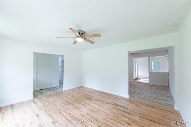 1575 County Road 3290, Salem, MO 65560 - spare room featuring a ceiling fan, light wood finished floors, and baseboards