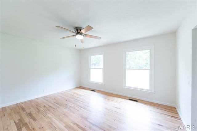 1575 County Road 3290, Salem, MO 65560 - empty room with light wood finished floors and a ceiling fan