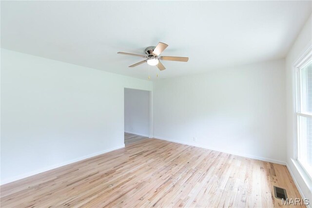 1575 County Road 3290, Salem, MO 65560 - unfurnished room with light wood-style floors, ceiling fan, and baseboards