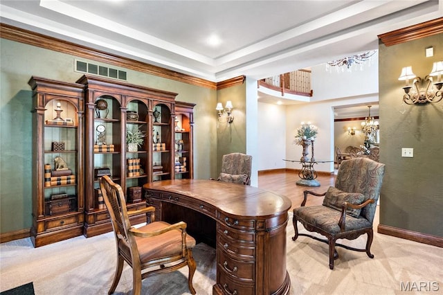 home office with a chandelier, baseboards, a tray ceiling, and crown molding