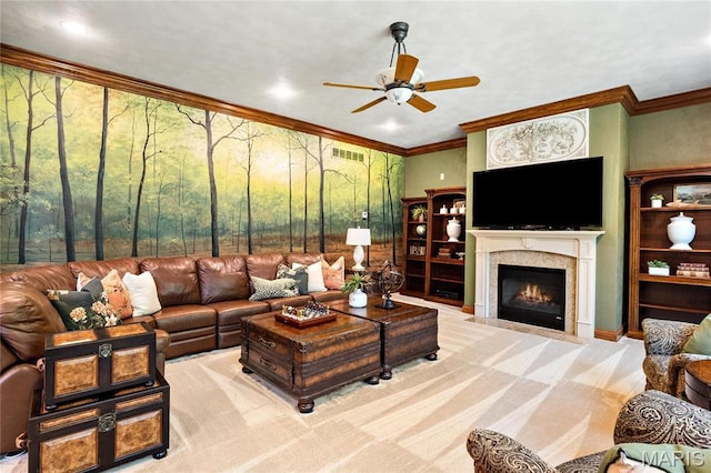 carpeted living room featuring a ceiling fan, a fireplace with flush hearth, and crown molding