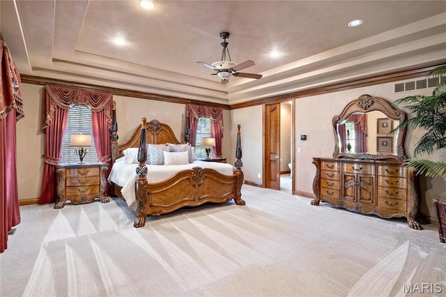 bedroom featuring carpet, a raised ceiling, baseboards, recessed lighting, and ornamental molding