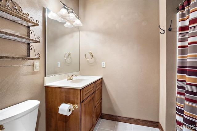 full bathroom featuring vanity, toilet, baseboards, tile patterned flooring, and curtained shower