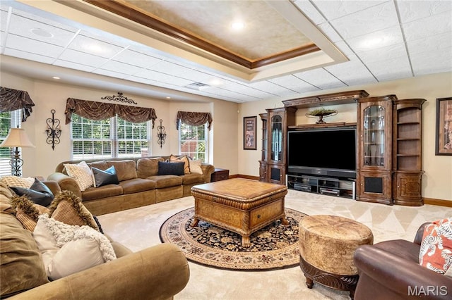 carpeted living room featuring baseboards and recessed lighting