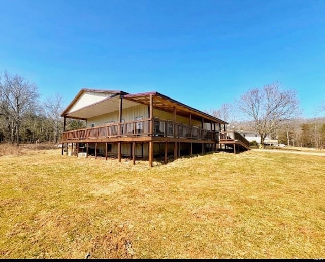 12607 Hwy N, Middlebrook, MO 63656 - rear view of property with a wooden deck and a lawn