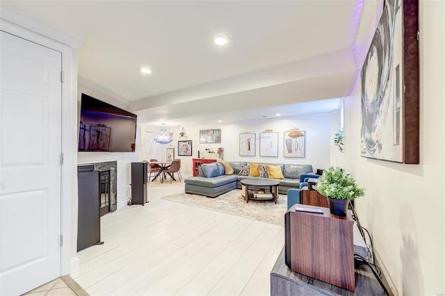 4561 Laclede Ave Unit B, Saint Louis, MO 63108 - living area with recessed lighting, a fireplace, and light wood-type flooring