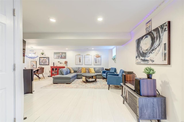 4561 Laclede Ave Unit B, Saint Louis, MO 63108 - living area with recessed lighting and wood finished floors