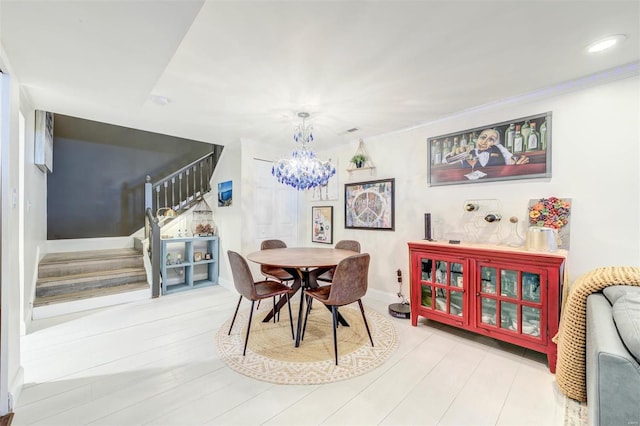 4561 Laclede Ave Unit B, Saint Louis, MO 63108 - dining room featuring stairway, a chandelier, ornamental molding, recessed lighting, and baseboards