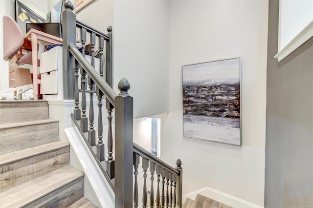 4561 Laclede Ave Unit B, Saint Louis, MO 63108 - stairway featuring wood finished floors and baseboards