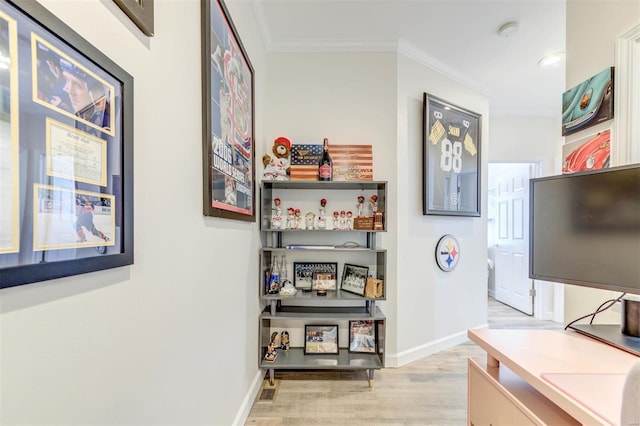 4561 Laclede Ave Unit B, Saint Louis, MO 63108 - office area with light wood-style flooring, ornamental molding, and baseboards