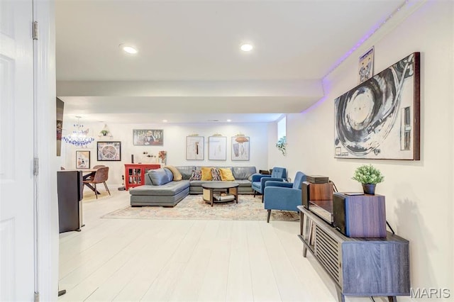 4561 Laclede Ave Unit B, Saint Louis, MO 63108 - living room featuring recessed lighting and wood finished floors