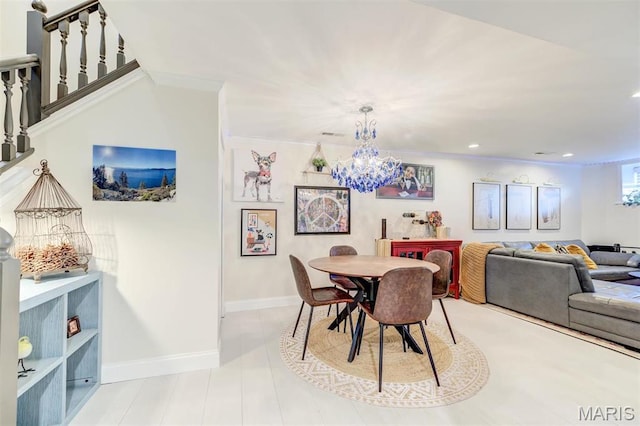 4561 Laclede Ave Unit B, Saint Louis, MO 63108 - dining space with a chandelier, baseboards, recessed lighting, and ornamental molding