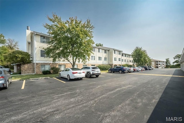 942 Guelbreth Ln Unit 112, Saint Louis, MO 63141 - view of property featuring uncovered parking