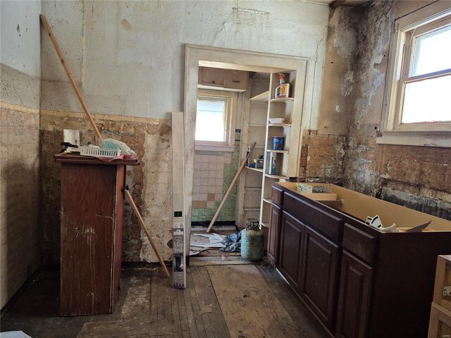 2653 Washington Ave, Granite City, IL 62040 - miscellaneous room featuring a wainscoted wall and wood-type flooring