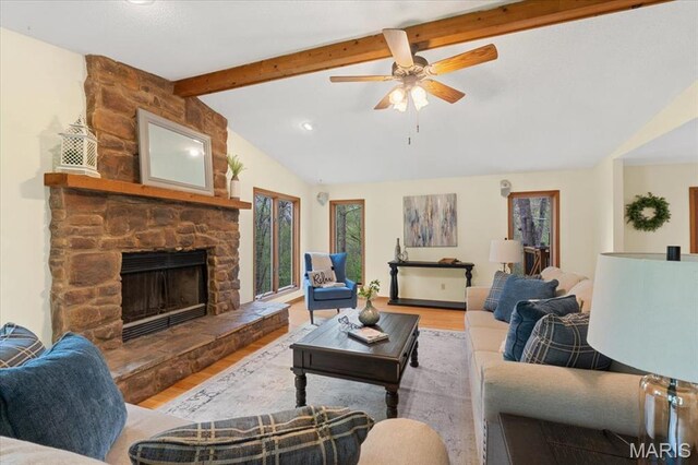 1346 Forest Splendor Trl, Wildwood, MO 63021 - living area with light wood finished floors, a ceiling fan, a stone fireplace, and recessed lighting