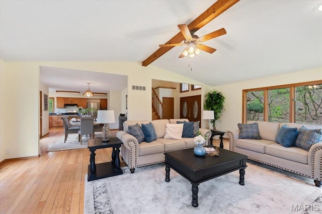 1346 Forest Splendor Trl, Wildwood, MO 63021 - living room featuring light wood-type flooring, stairs, a ceiling fan, and baseboards