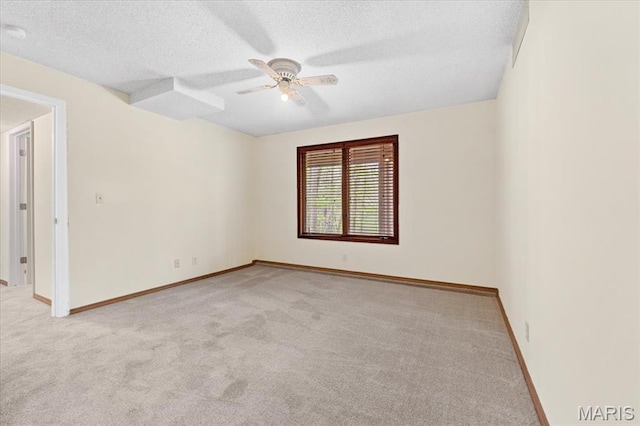 1346 Forest Splendor Trl, Wildwood, MO 63021 - carpeted spare room with a textured ceiling, a ceiling fan, and baseboards