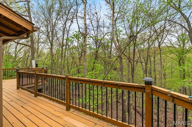 1346 Forest Splendor Trl, Wildwood, MO 63021 - wooden terrace featuring a forest view