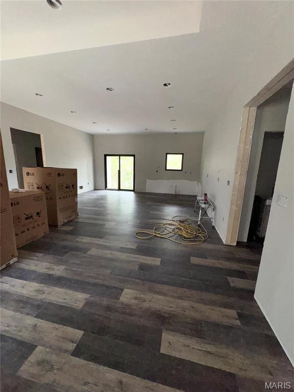 unfurnished living room featuring wood finished floors
