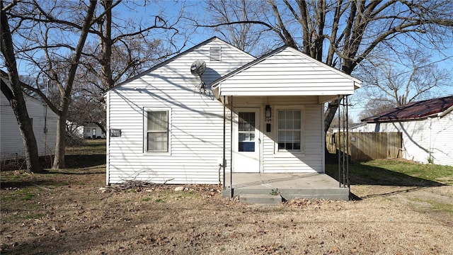 204 W 8th St, Kennett, MO 63857 - view of front facade featuring fence