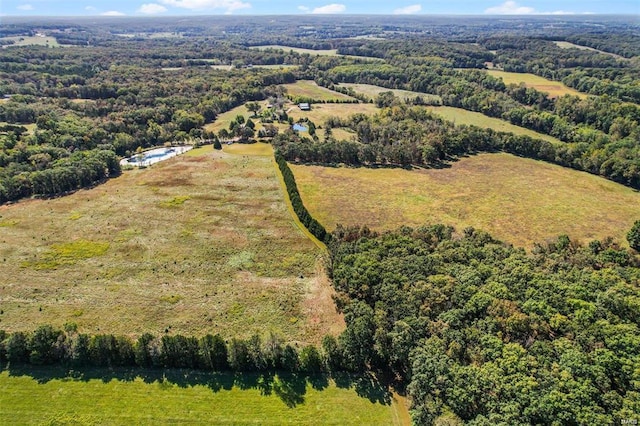 drone / aerial view of a heavily wooded area