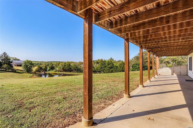 view of patio / terrace featuring a water view