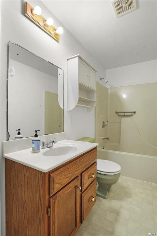 full bathroom with bathing tub / shower combination, vanity, toilet, and tile patterned floors