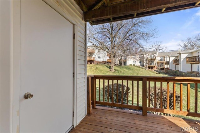 1436 Peacock Ln, Saint Louis, MO 63144 - wooden terrace featuring a residential view and a lawn