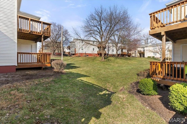1436 Peacock Ln, Saint Louis, MO 63144 - view of grassy yard with a wooden deck, a residential view, and a balcony