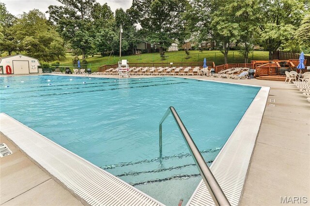 1436 Peacock Ln, Saint Louis, MO 63144 - community pool featuring view of scattered trees