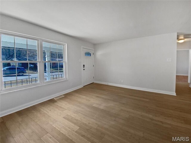 1248 Green Knoll Dr, Fenton, MO 63026 - entryway featuring baseboards and wood finished floors