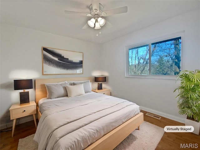1248 Green Knoll Dr, Fenton, MO 63026 - bedroom featuring baseboards, wood finished floors, and ceiling fan