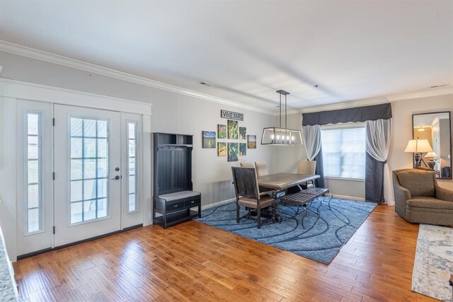24345 State Route Ww Unit 40/41, Saint Genevieve, MO 63670 - dining area featuring hardwood / wood-style flooring, crown molding, and baseboards