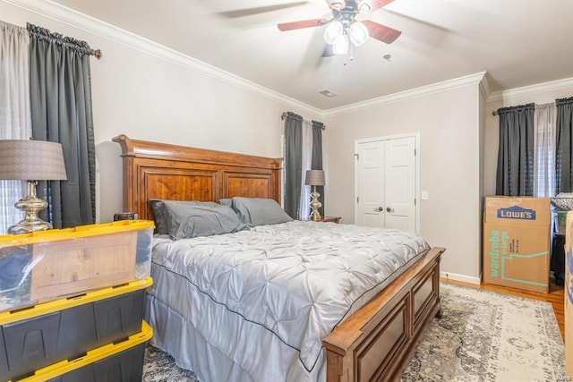 24345 State Route Ww Unit 40/41, Saint Genevieve, MO 63670 - bedroom with ornamental molding, baseboards, wood finished floors, and a ceiling fan