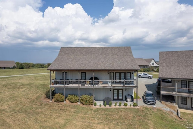 24345 State Route Ww Unit 40/41, Saint Genevieve, MO 63670 - rear view of house with french doors, a yard, and roof with shingles