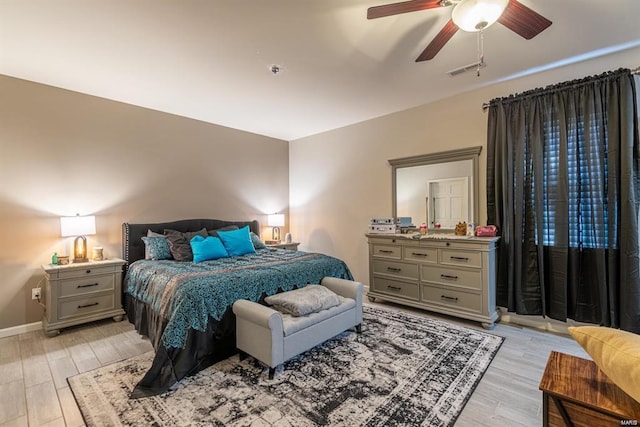 24345 State Route Ww Unit 40/41, Saint Genevieve, MO 63670 - bedroom with light wood-style floors, ceiling fan, and baseboards