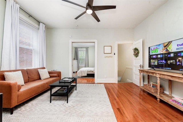 4271 Botanical Ave, Saint Louis, MO 63110 - living room with a ceiling fan, wood finished floors, and baseboards